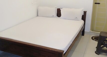 Limra Residency Room Type - Deluxe Room without AC