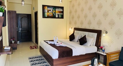 Hotel Natures Feast Room Type - Super Deluxe Room With Waterfall Mountain View and Private Balcony