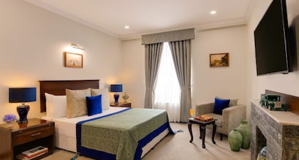 Ambassador, New Delhi - IHCL SeleQtions Room Type - SeleQtions Suite with Breakfast, One Way Airport Transfer and Balcony Ambassador, New Delhi - IHCL SeleQtions Room Type - SeleQtions Suite with Breakfast, One Way Airport Transfer and Balcony