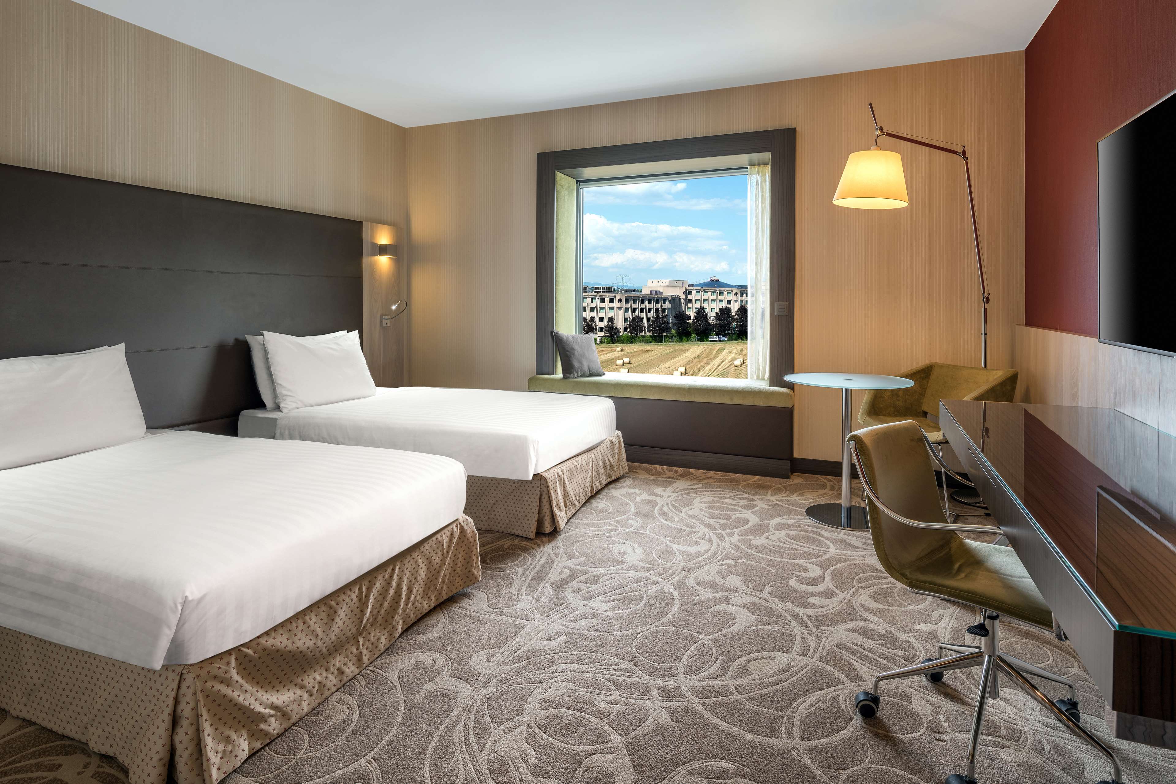 Hilton Geneva Hotel & Conference Centre - Tap to explore photos