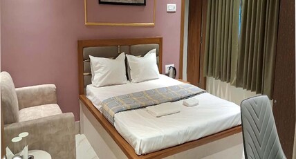 Delight banquet and guest house Room Type - Deluxe Room AC