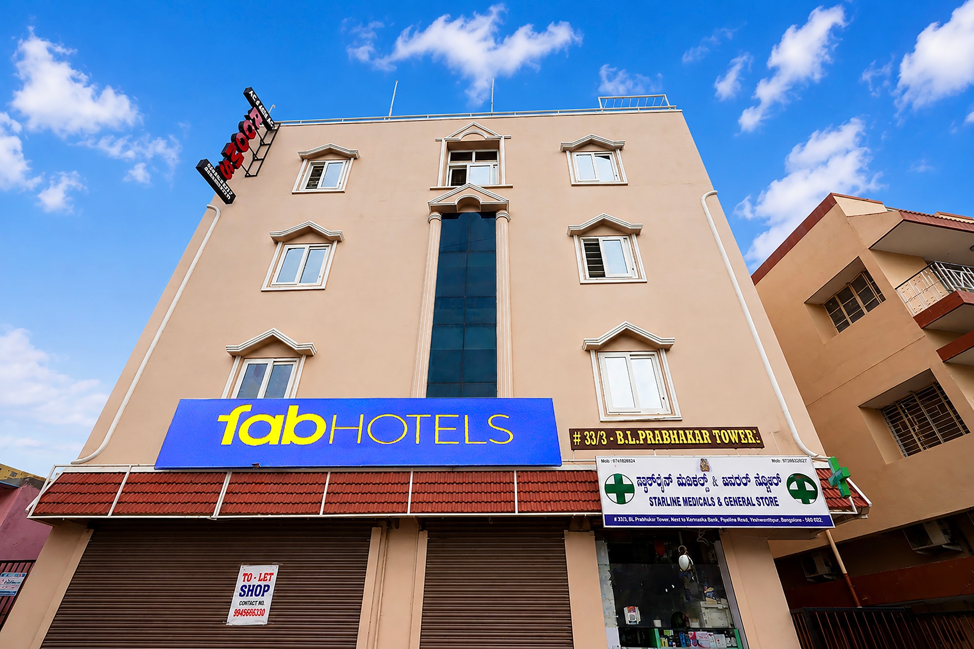 FabHotel Dhaya Grand Inn - Tap to explore photos