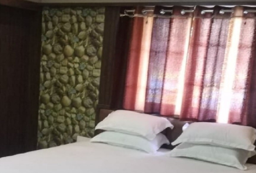 Ashok Hotel - Tap to explore photos