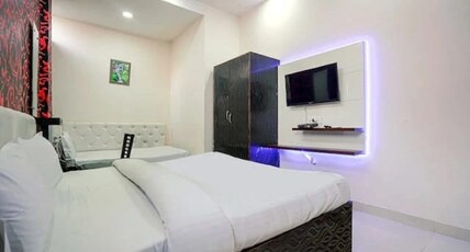 Vishnu Residency Inn Room Type - Triple Bed AC Room