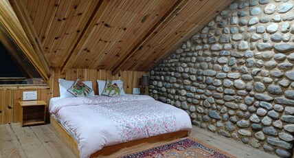 Ishan Log Hut Room Type - Executive Family Suite With Balcony And Snow Capped Thirthan Range Mountain View Ishan Log Hut Room Type - Executive Family Suite With Balcony And Snow Capped Thirthan Range Mountain View