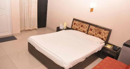 ITL Residency Room Type - Deluxe Room AC