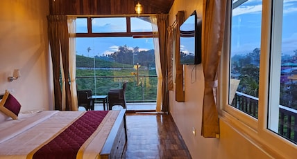 ASR Holidays ,Valparai Room Type - Luxury Wooden suite 3 with Tea field and river view ASR Holidays ,Valparai Room Type - Luxury Wooden suite 3 with Tea field and river view