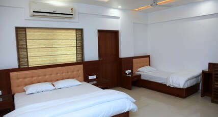 HOTEL MARVEL INN & BANQUET HALL Room Type - SUPER DELUXE