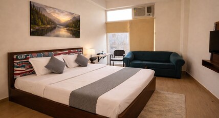 Cozi inn Room Type - King Size Luxury Room