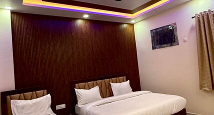 Shubharambh Green's  Room Type - Deluxe Room