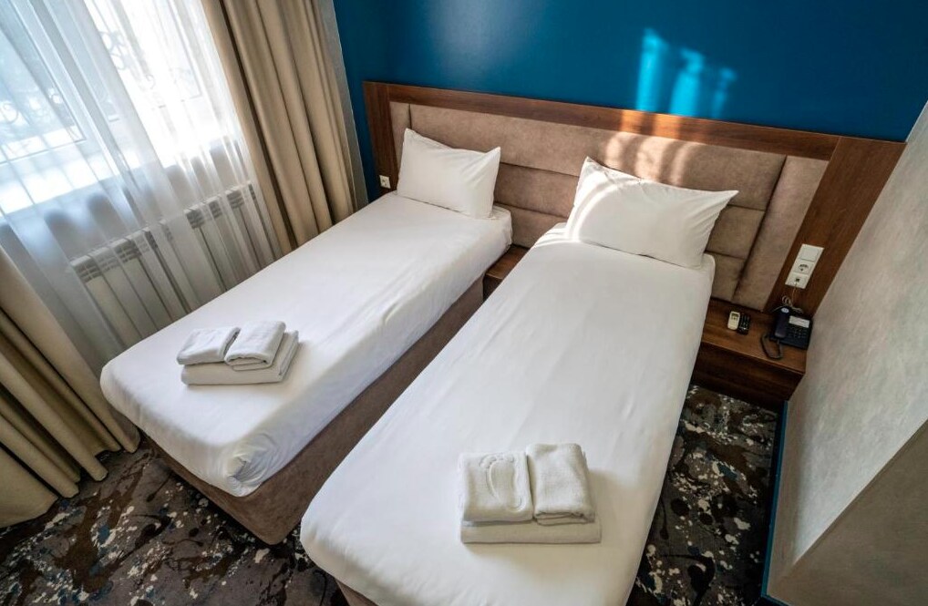 Hotel MILDOM Express - Tap to explore photos