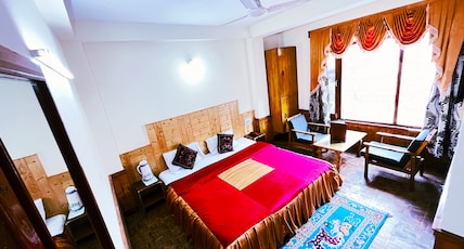 Hotel Snow Mountain Mall Road Manali Room Type - Super Deluxe room