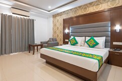 Treebo Grand Legacy Elite With Roof Top Cafe