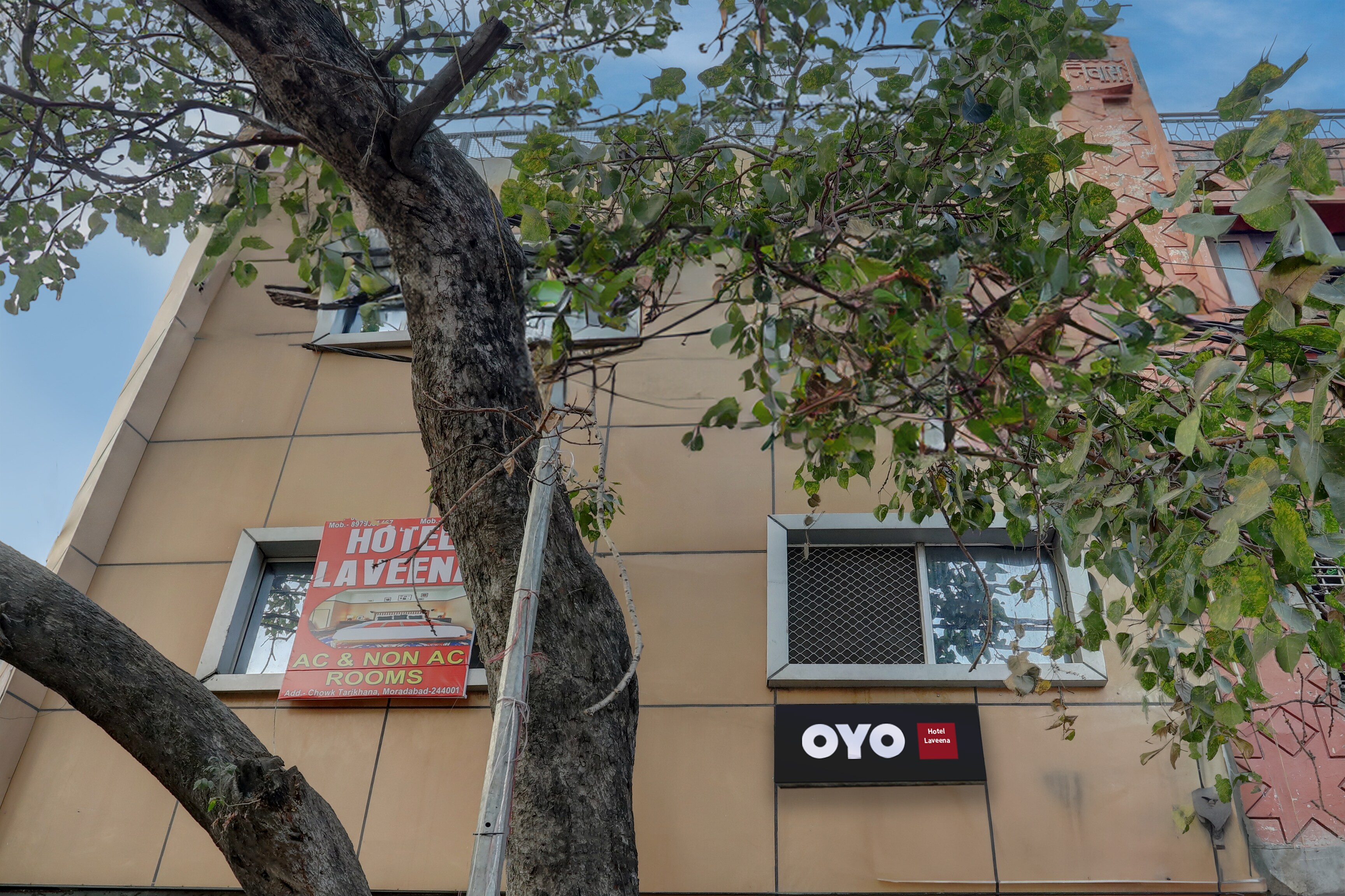 Hotel O by OYO Laveena - Tap to explore photos