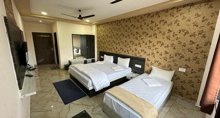 OM GAURI RESTAURANT & ROOMS Room Type - Tripple sharing Room
