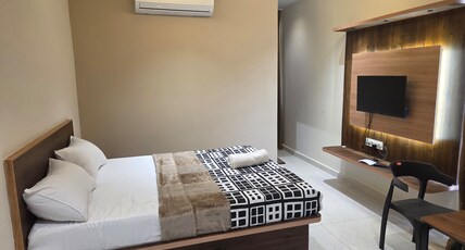 BAY VIEW RESIDENCY Room Type - Deluxe Room with Air Conditioning
