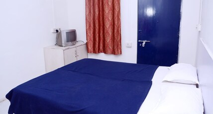 Hotel Sairam Lodge Room Type - Deluxe Room