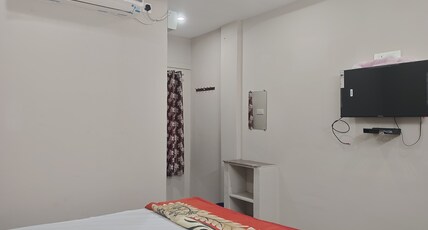 Karthikeya Inn Room Type - DELUXE AC ROOM