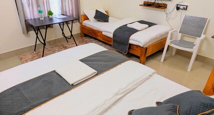 Accomoon hillside homes Room Type - Triple bed deluxe room with mountain view