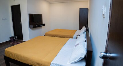 Mookambika Comforts Room Type - Deluxe Quadruple AC