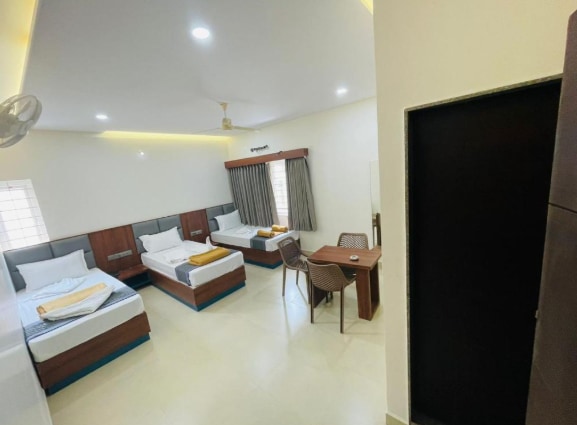 Royal Inn Lodge Dharwad - Tap to explore photos