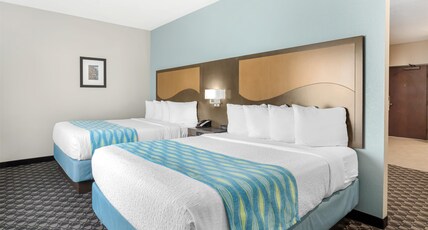 Best Western Plus Waller Hotel Room Type - Suite-2 Queen Beds, Non-Smoking, Larger Room, Kitchenette, Pillowtop Bed, Sofabed, Full Breakfast