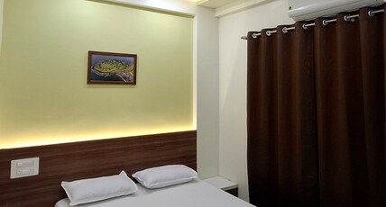 Radhakrushna Retreat Room Type - Deluxe AC Room