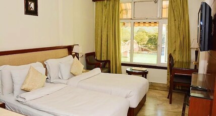 Antarman Stays l Riverside Room Type - Super Deluxe Room ( Ganga Facing )