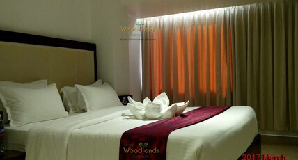 Arcot Woodlands Hotel Room Type - DELUXE KING SIZE BED ROOM