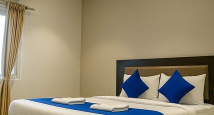 Hotel Karpagam Lodging House Room Type - Deluxe Queen Bed