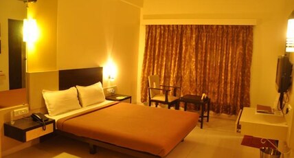 HOTEL VARSHA INTERNATIONAL RESIDENCY Room Type - Deluxe Room