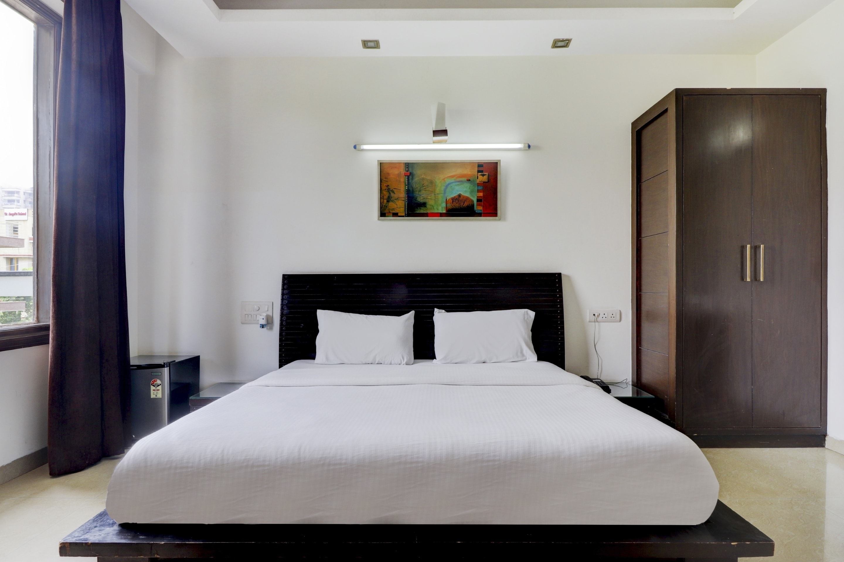 Collection O Marina Suites - Tap to explore photos