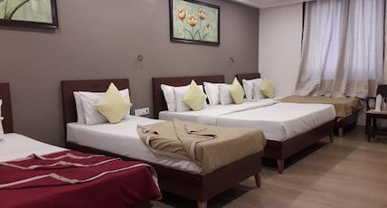 Manwar Garden Resort (Pure Veg.) Room Type - Four Bed Family AC Room with Hill View Manwar Garden Resort (Pure Veg.) Room Type - Four Bed Family AC Room with Hill View