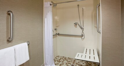 Holiday Inn Express & Suites Bloomington West Room Type - 1 King Standard Comm Access Roll Shower