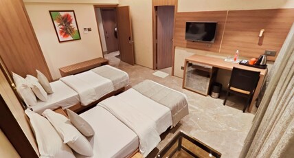HOTEL ARCHANA RESIDENCY Room Type - Premium Deluxe