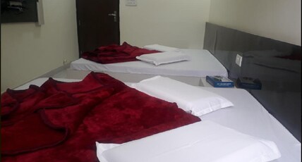 Hotel Moon Sky Room Type - Deluxe Three Bed Non AC