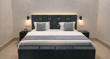 HOTEL SANT KRIPA STAYS Room Type - Super Deluxe Room