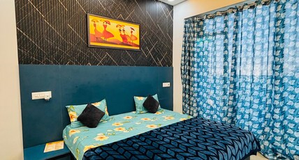 Dream holiday Studios in Gaur City Centre Room Type - Bedroom