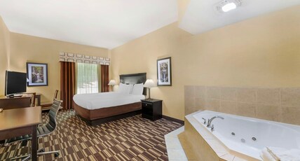 Best Western Plus Victor Inn & Suites Room Type - 1 King Bed, Non-Smoking, Whirlpool, Microwave And Refrigerator, High Speed Internet Access, Coffee M Best Western Plus Victor Inn & Suites Room Type - 1 King Bed, Non-Smoking, Whirlpool, Microwave And Refrigerator, High Speed Internet Access, Coffee M