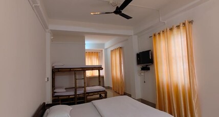 Travellers Hostel Dirang Room Type - Deluxe Room With Sofa Cum Bed