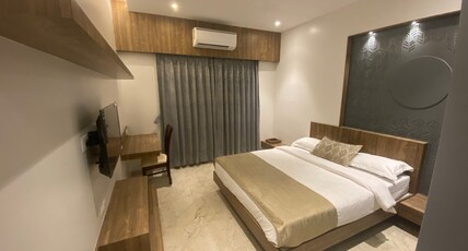 Hotel Dwarka Grand Room Type - Deluxe Room