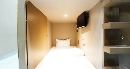 Astropod A unit of ammas palace hotel Room Type - Male Dormitory