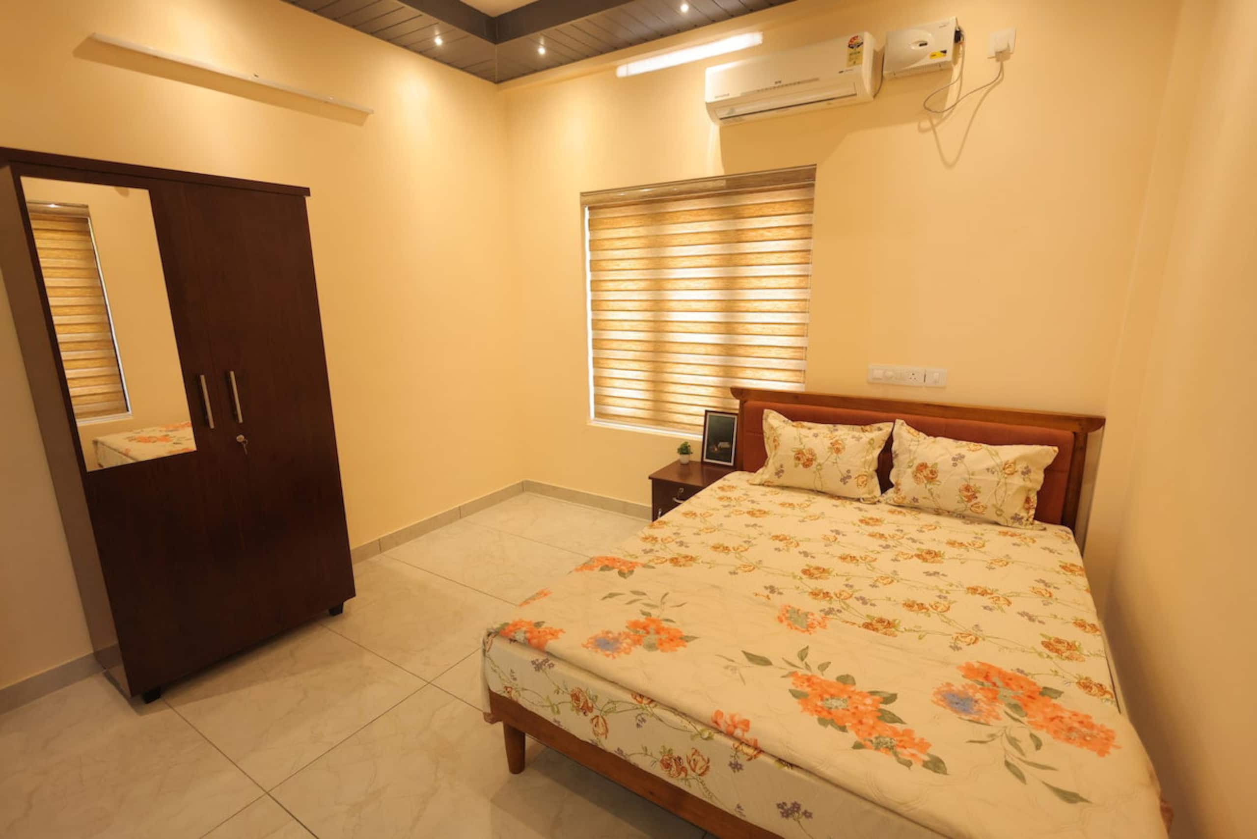 Red Suites 2BHK by Happifistays - Tap to explore photos