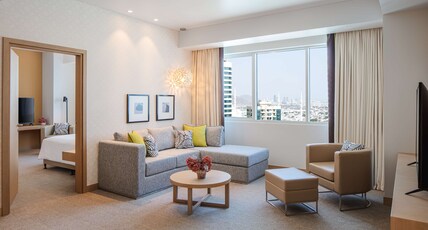 DoubleTree by Hilton Fujairah City Room Type - KING ONE BEDROOM SUITE