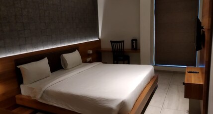 The Bliss Hotel - Pure Veg Room Type - Deluxe AC Double Bed