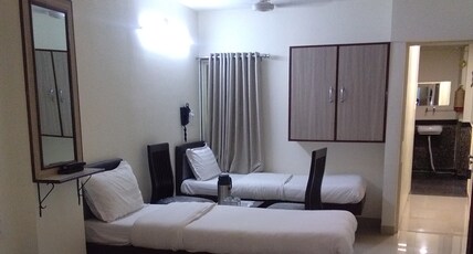 HOTEL BASERA Room Type - DELUXE FAMILY FOUR BED AC