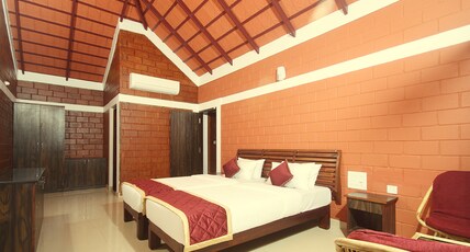 Coffee Grove Resort  Room Type - Deluxe Cottage AC