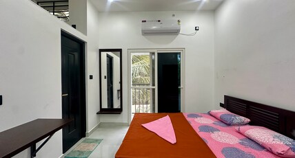 Nana's Residency, Aluva Room Type - Premium Bedroom Upstairs with balcony 4
