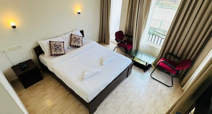 The Thekkady Haritham Residency Room Type - Deluxe King Bed Room with Hill View The Thekkady Haritham Residency Room Type - Deluxe King Bed Room with Hill View