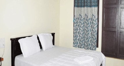 ATHIDI NIVAS Room Type - Deluxe room